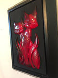 right angle on the piece in dramatic perspective, shows how shiny the kitties are